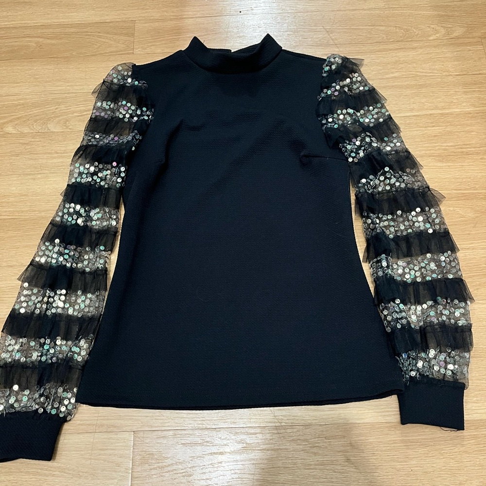 Elegant Black Top with Sequin Sleeves